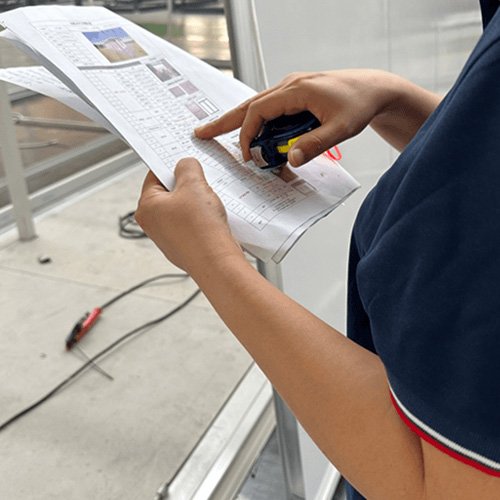 Quality inspection records being checked before loading